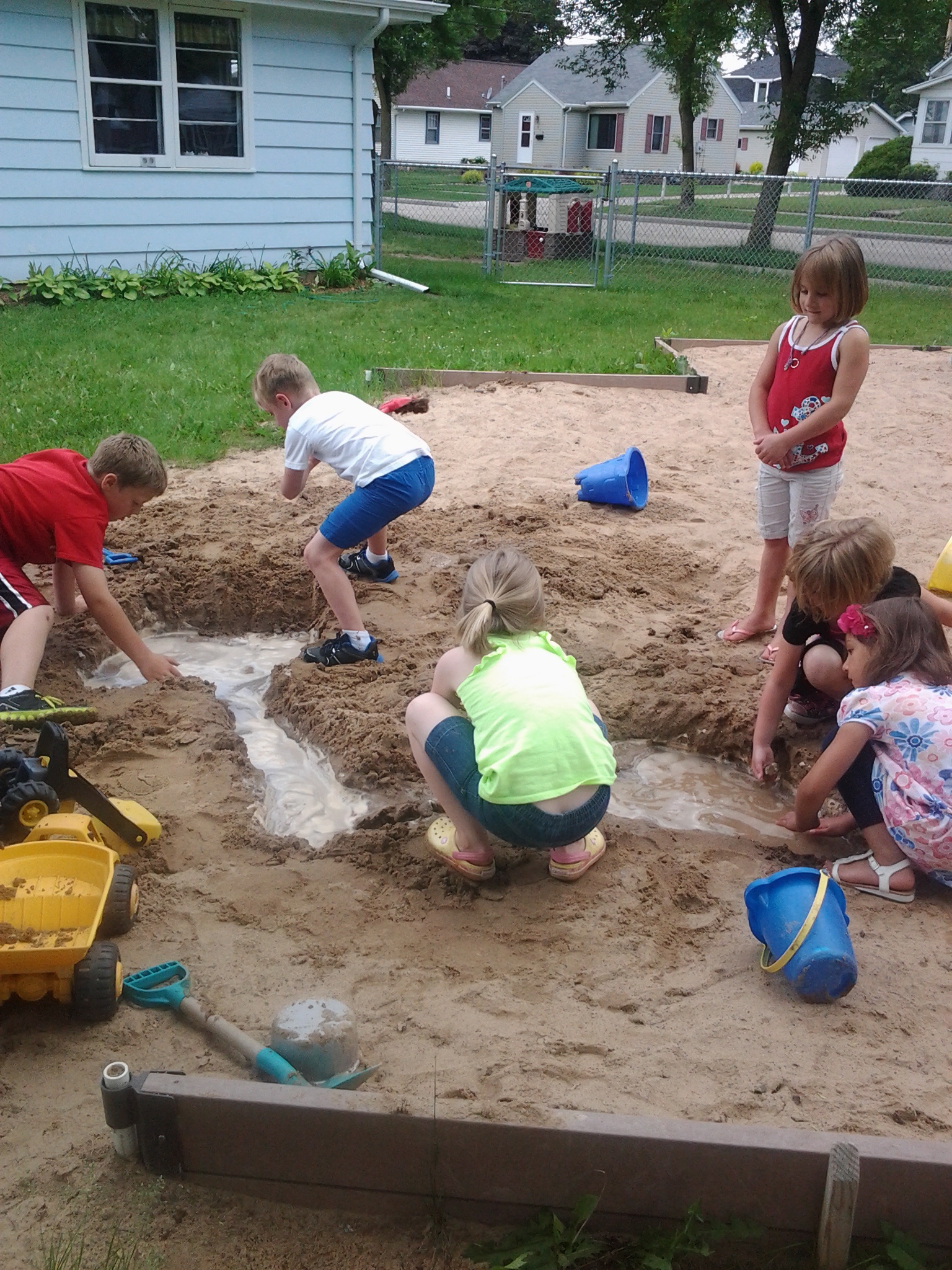 sand play during Community Child Care Center Summer Programs