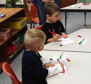 children color during Community Child Care Center Wrap Around Program