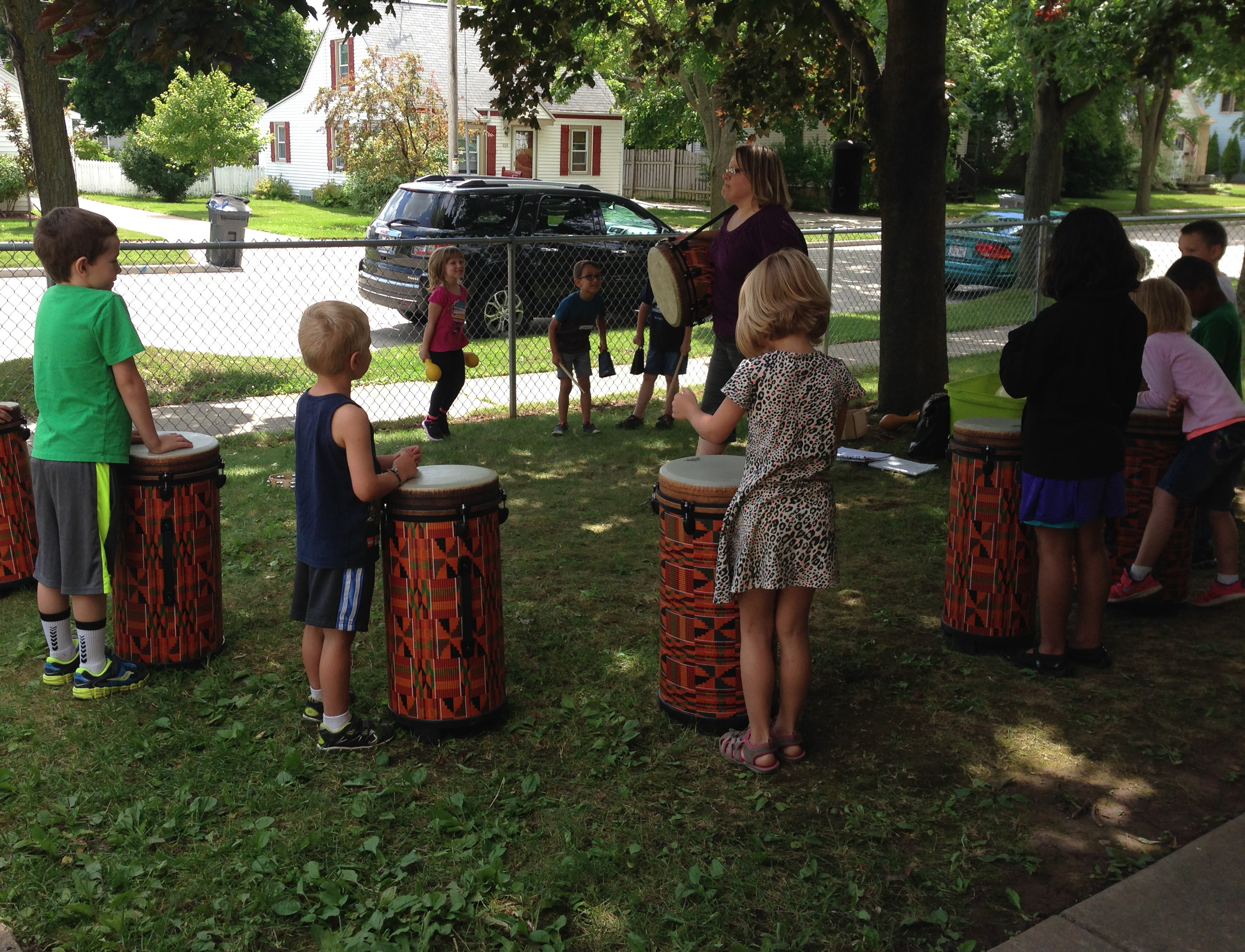 drum play during Community Child Care Center Summer Programs