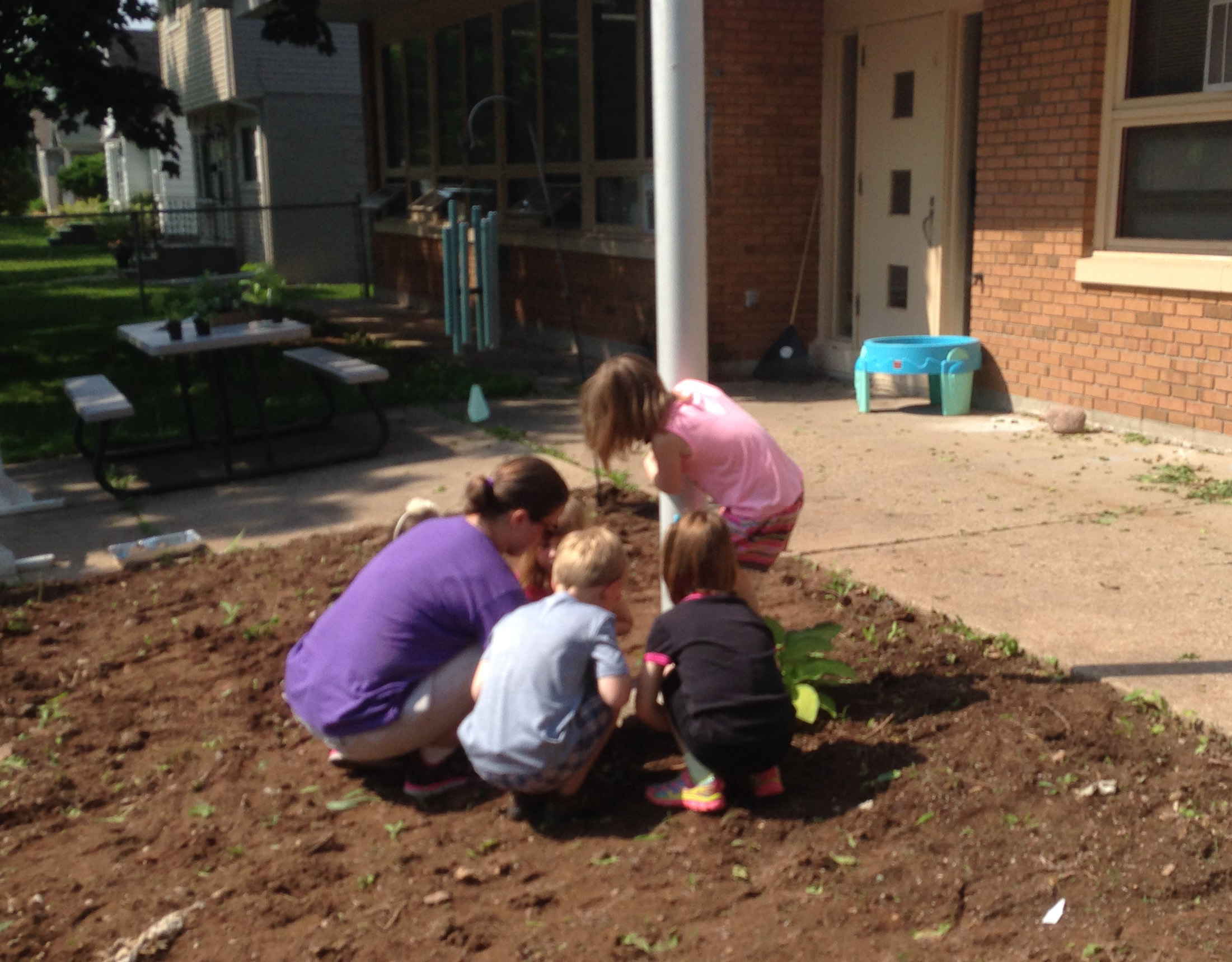 garden work during Community Child Care Center Summer Programs